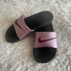 Nike slides.